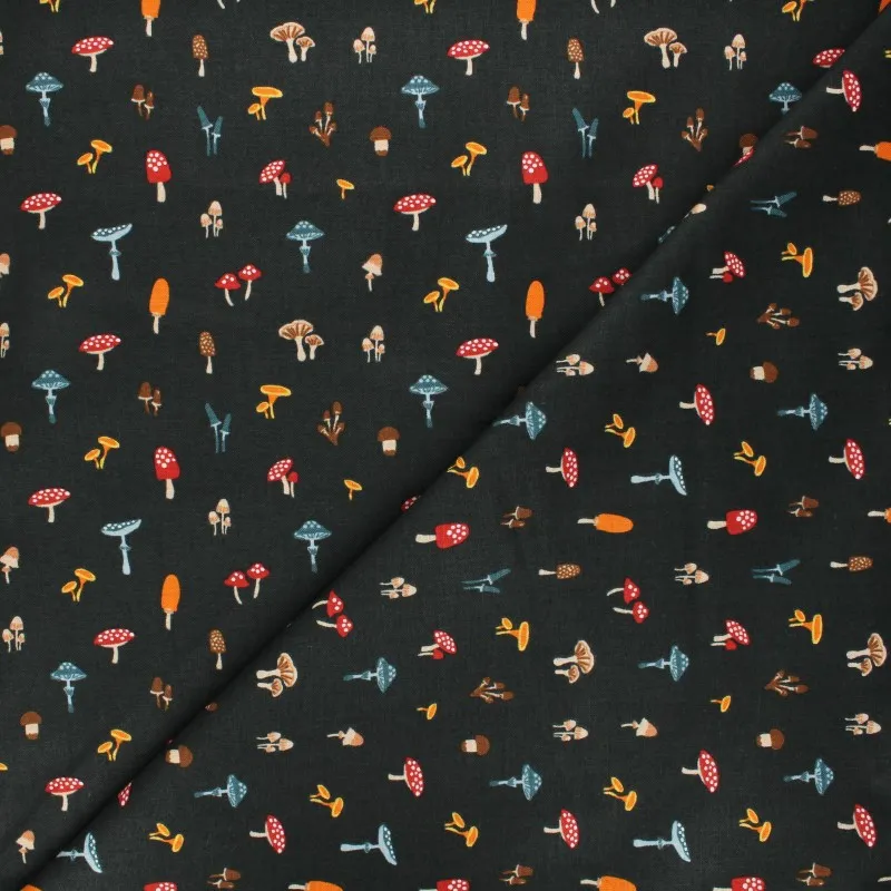 Cotton fabric black sweater with toadstool design.